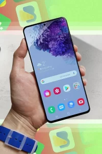 A Hand Holding A Phone And Several Apps In The Background Tekbilgin